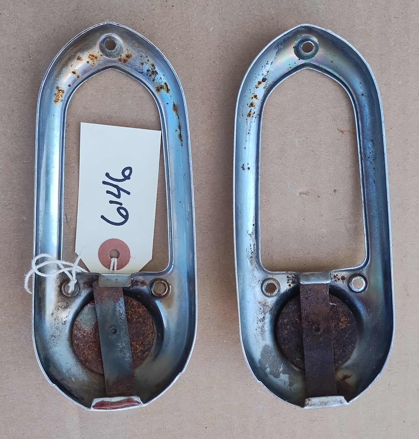 1950 Chevrolet taillight bezels pair