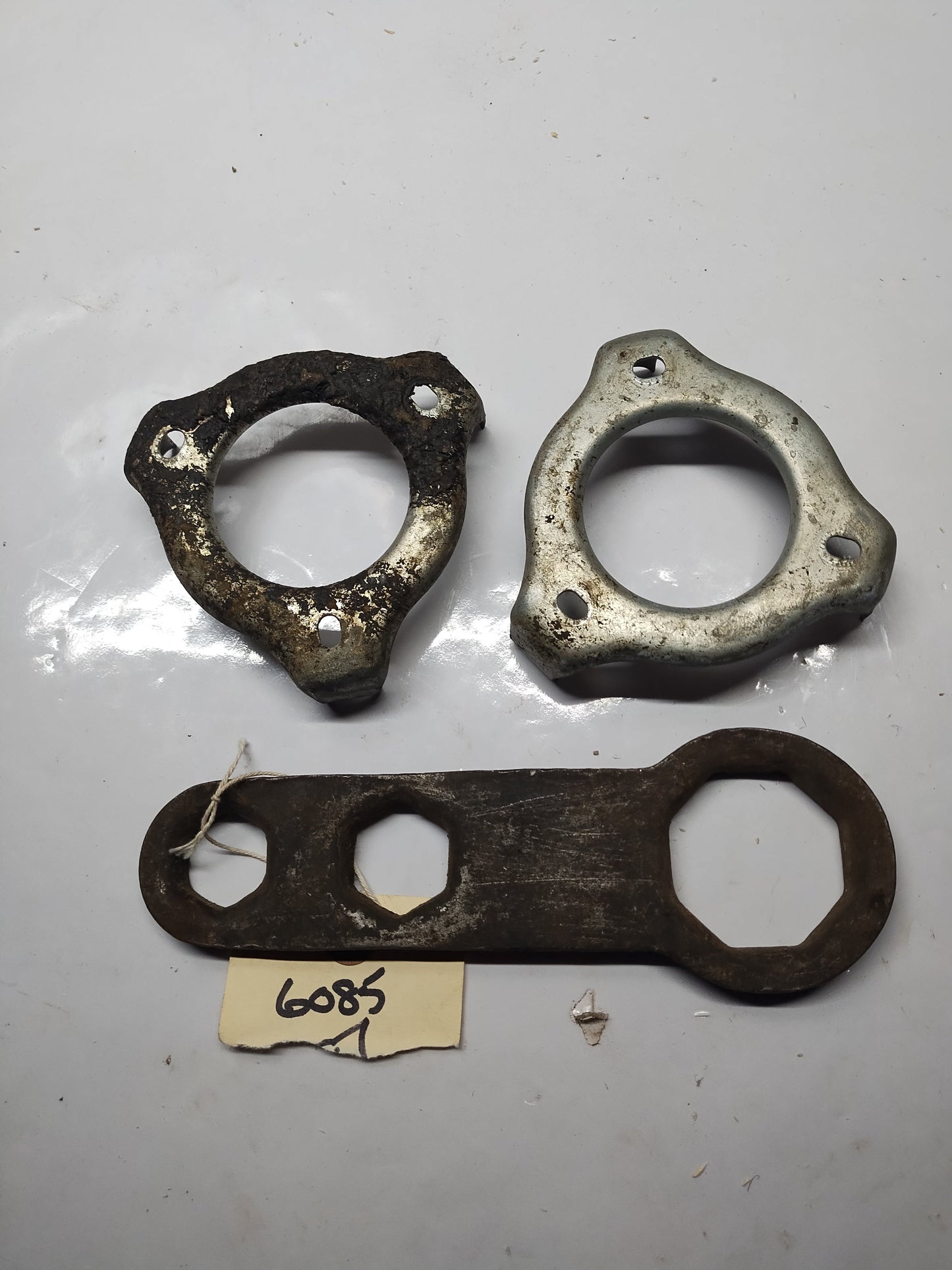 1950s wire wheel cover wrench and 2 center brackets