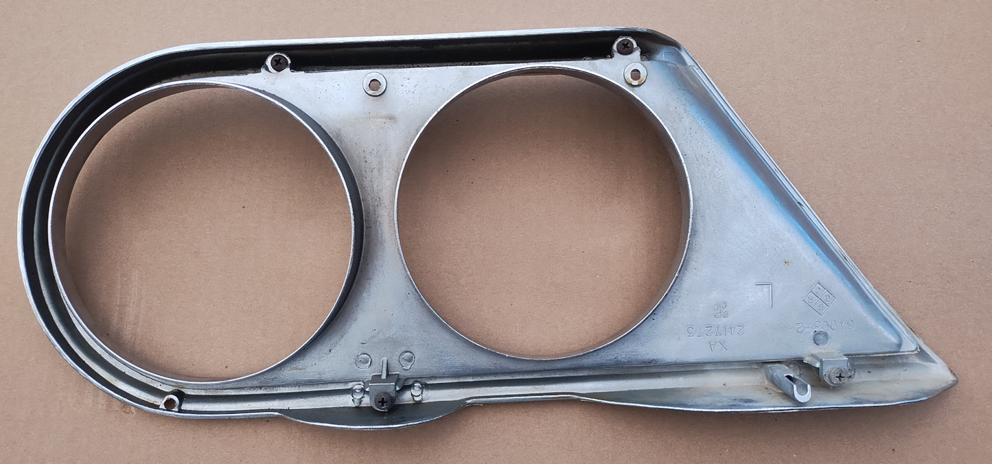 1964 Chrysler Newport headlight bezel LH