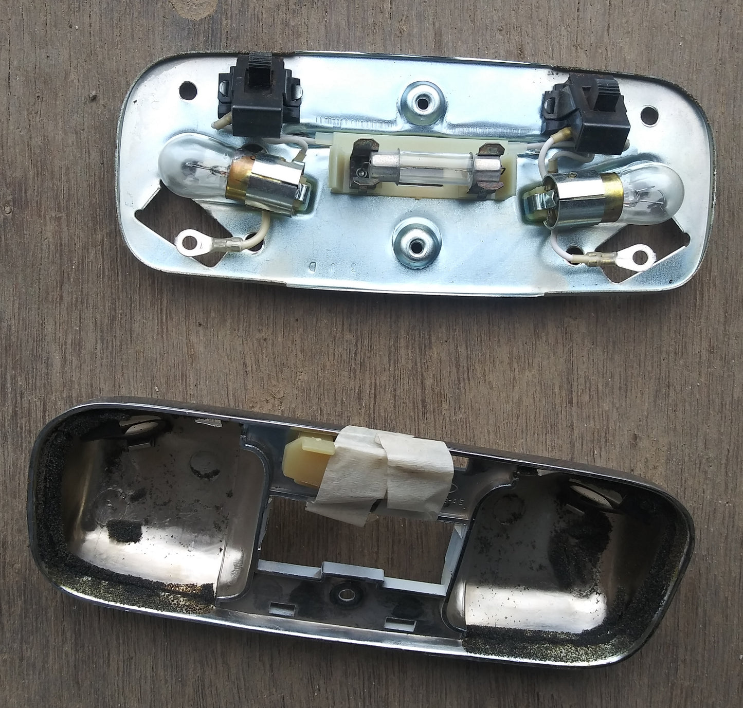 1970s Ford interior light with reader lights.