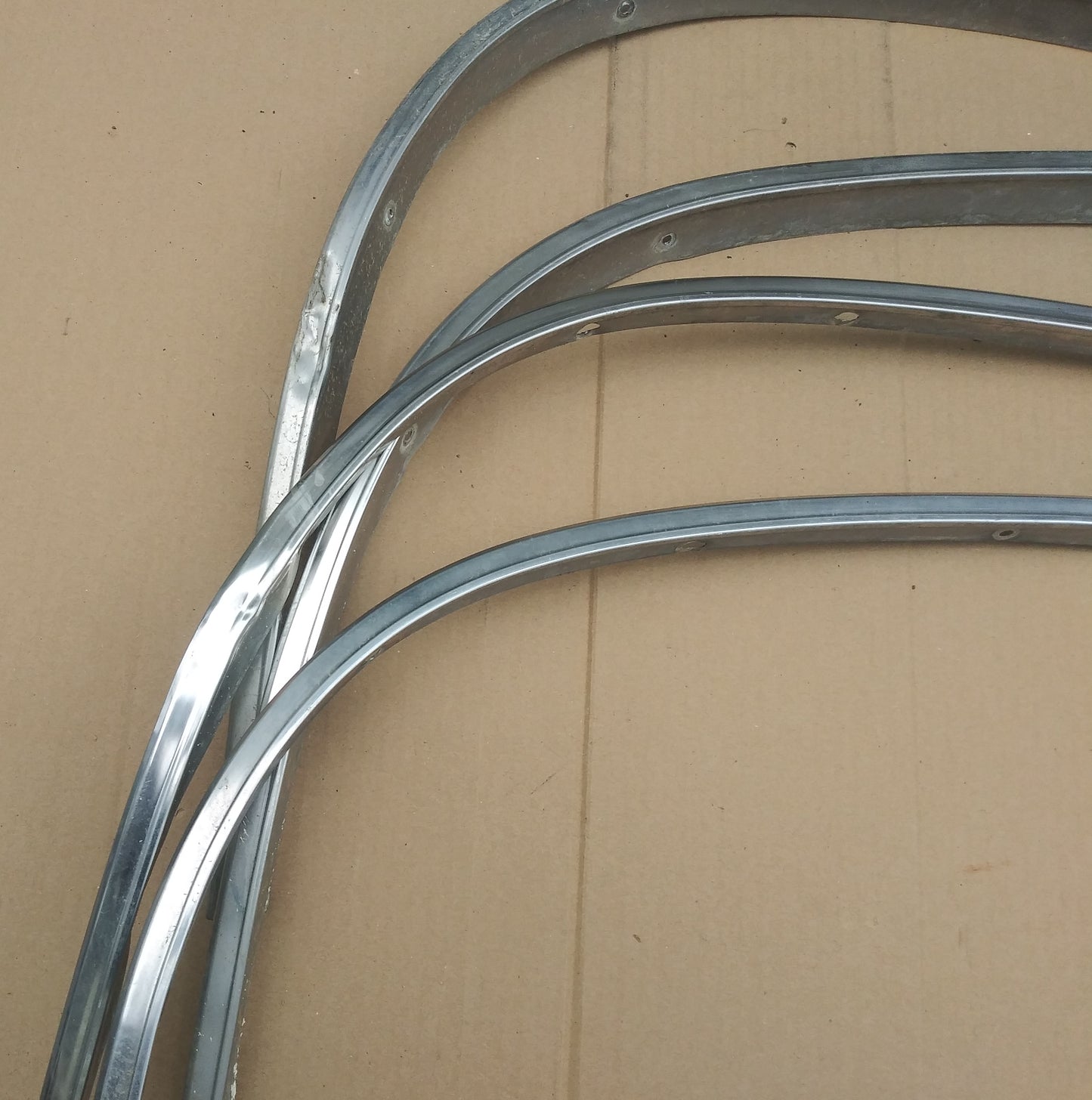 1985 Cadillac wheel lip moulding set