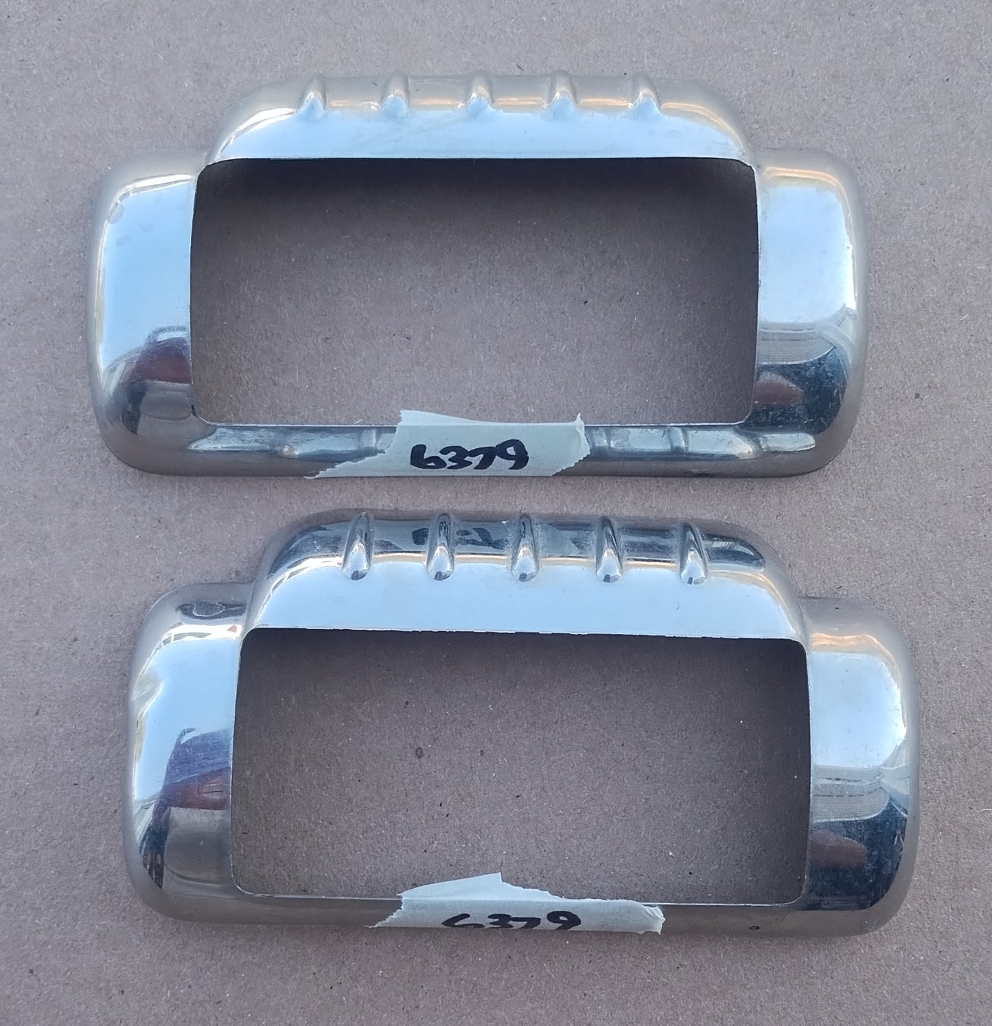 1946-47 Ford parking light/turn signal bezels pair