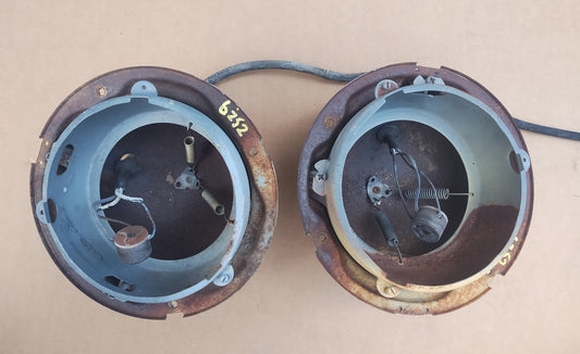 1955-56 Mercury headlight housing buckets pair