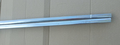 1957 Chevrolet 4D rear quarter trim pair