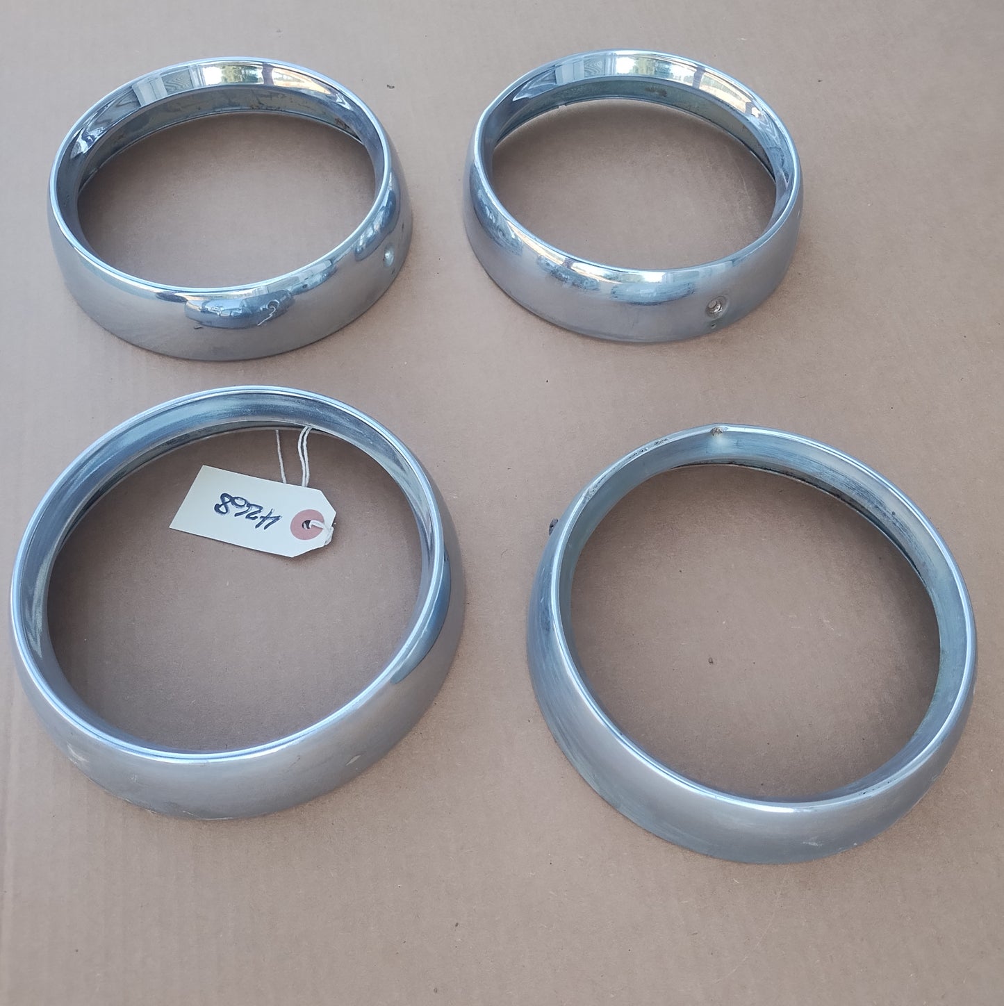 1958 Mercury headlight bezels set