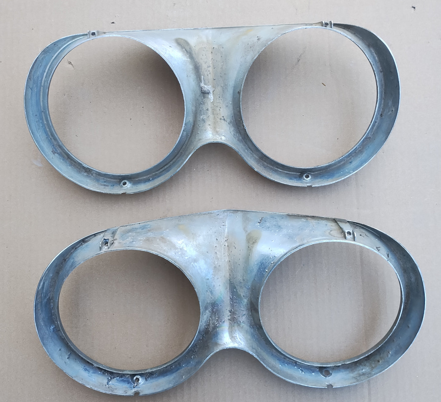 1959 Cadillac Headlight Bezels Pair