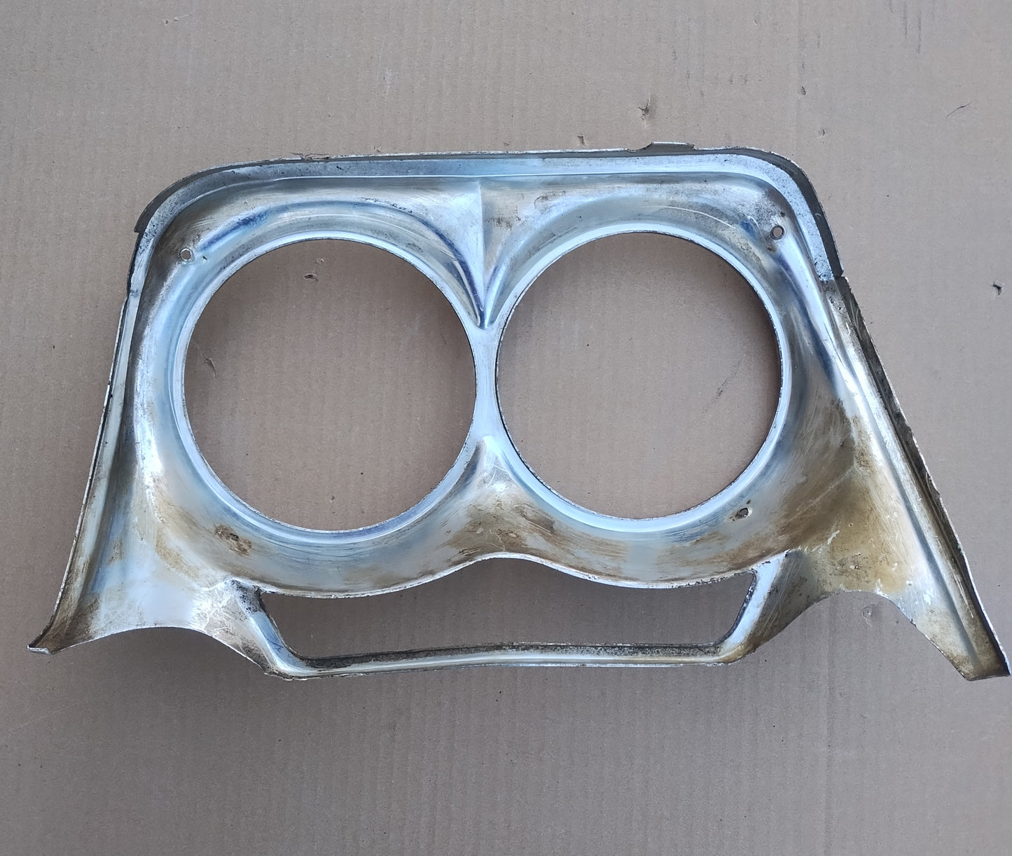 1962 Chevrolet headlight bezel driver side