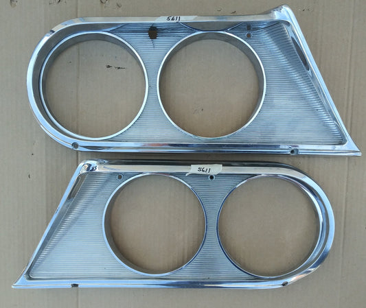 1964 Chrysler Newport headlight bezels pair