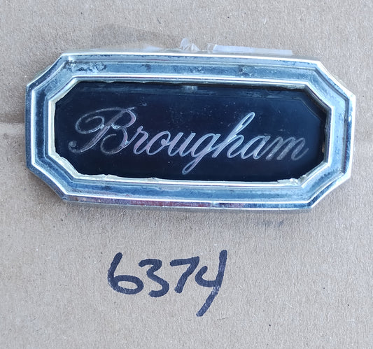 1970s Ford Brougham trim emblem