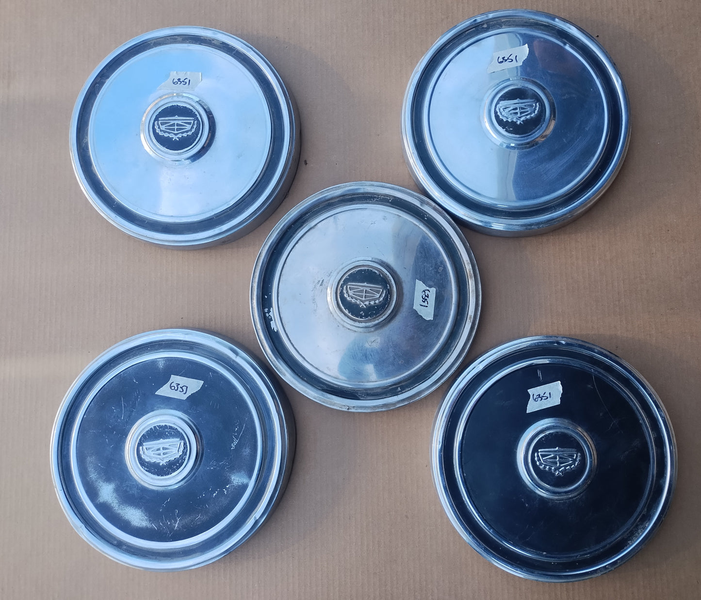 1970s Ford hubcaps with crest lot of 5