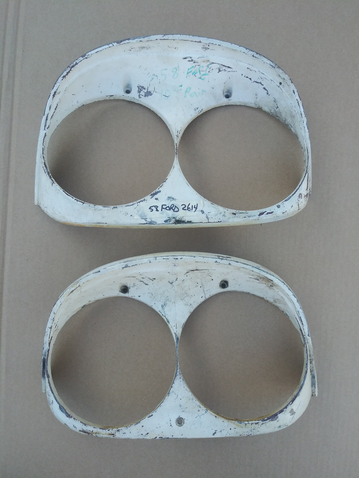 1958 Ford headlight bezels pair