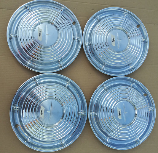 1962 Oldsmobile wheel covers 14" set