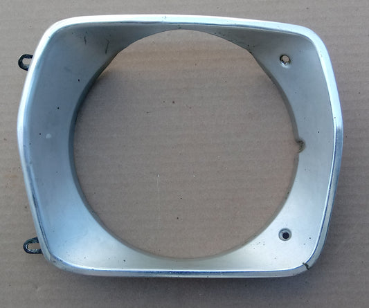 1975 Plymouth Valiant headlight bezel LH