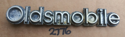 1977 Oldsmobile block letter badge